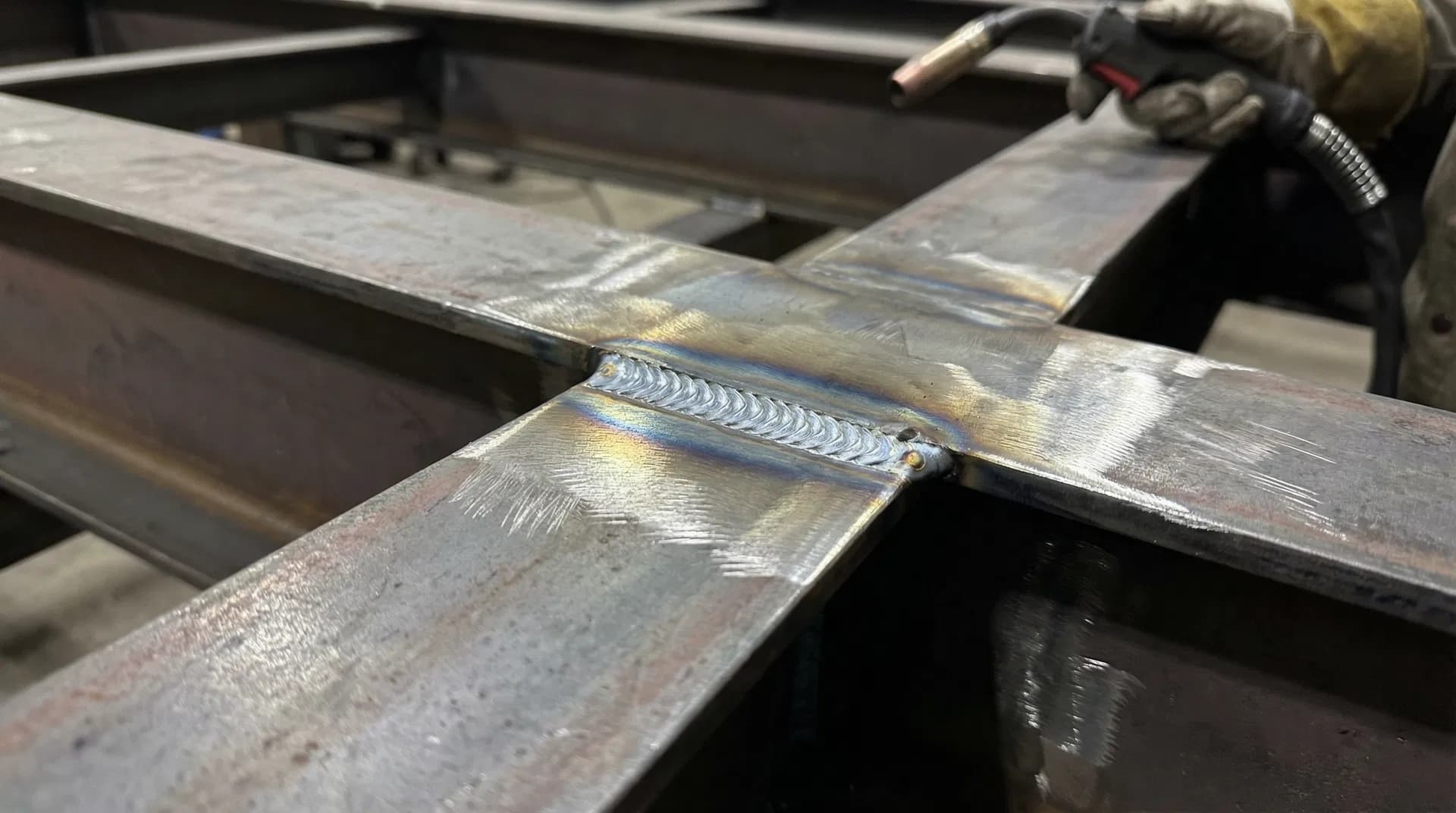 Professional welding work on a heavy-duty trailer