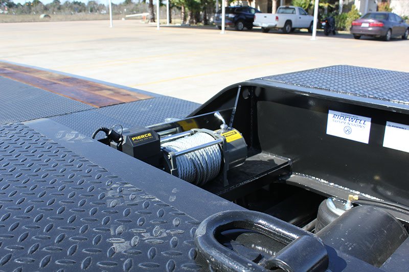 Recessed Pierce winch and forged D-ring on the deck edge of a lowboy trailer